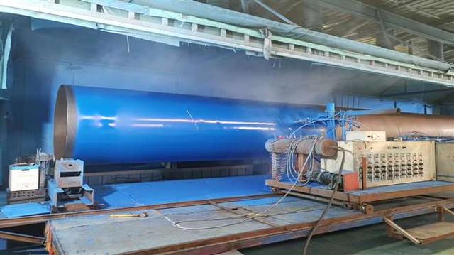 The application of epoxy powder to the steel water pipe.