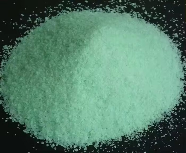 The ferrous sulfate granular particles.