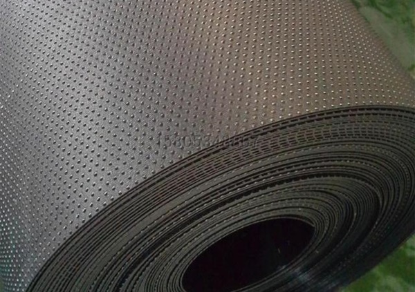 Textured HDPE geomembrane.